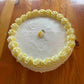 white cake with lemon buttercream icing and filling