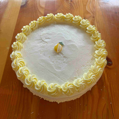 JK Bakery white cake with lemon buttercream icing and filling