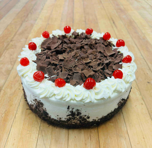 A lighter chocolate cake made the traditional way with kirsch, sour cherries and fresh whipped cream and chocolate shavings.